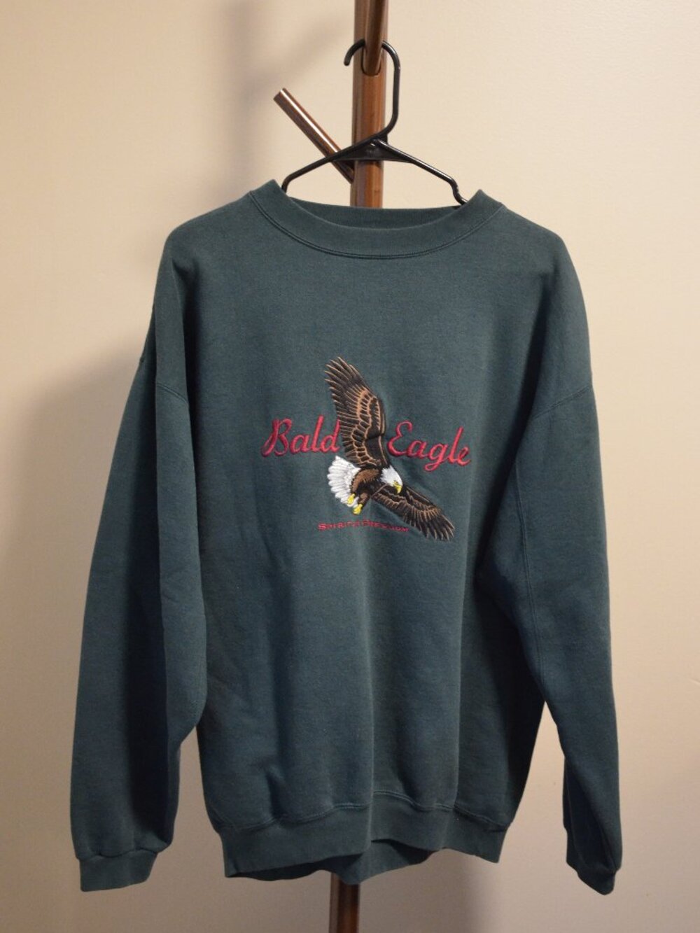 Dark green 'bald eagle' embroidered crewneck